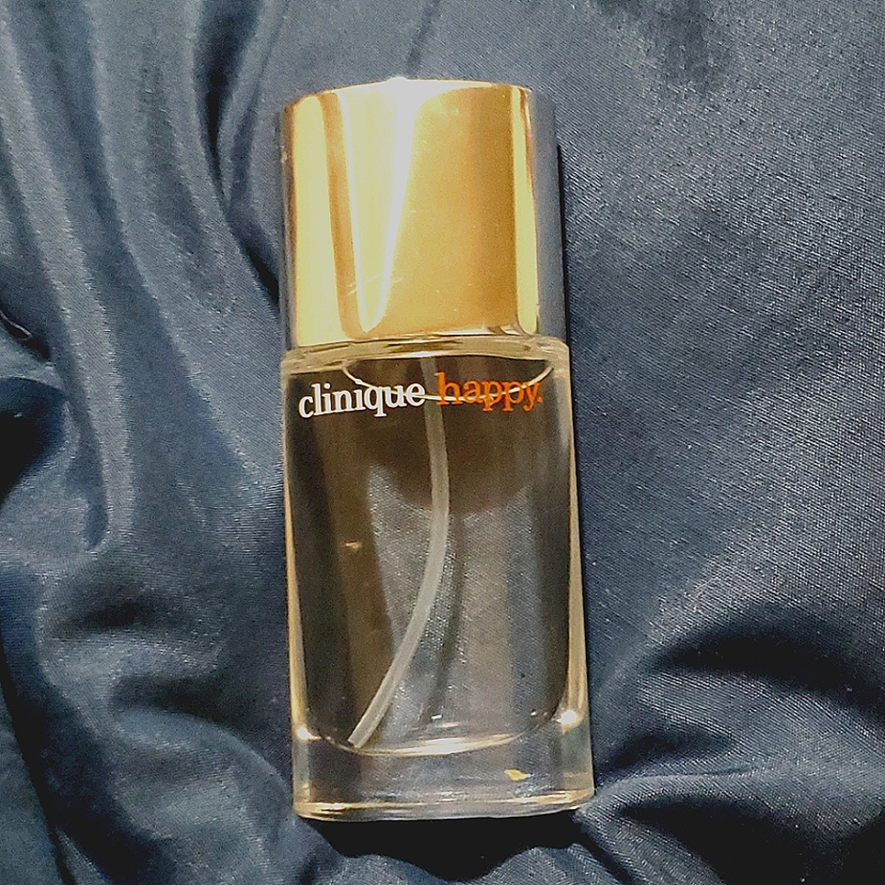 An 1oz. Bottle of Clinique Happy parfum spray
